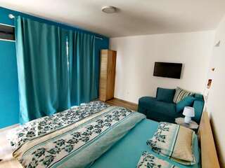 Апартаменты Apartments Suster Бар Трехместный номер, вид на сад-7